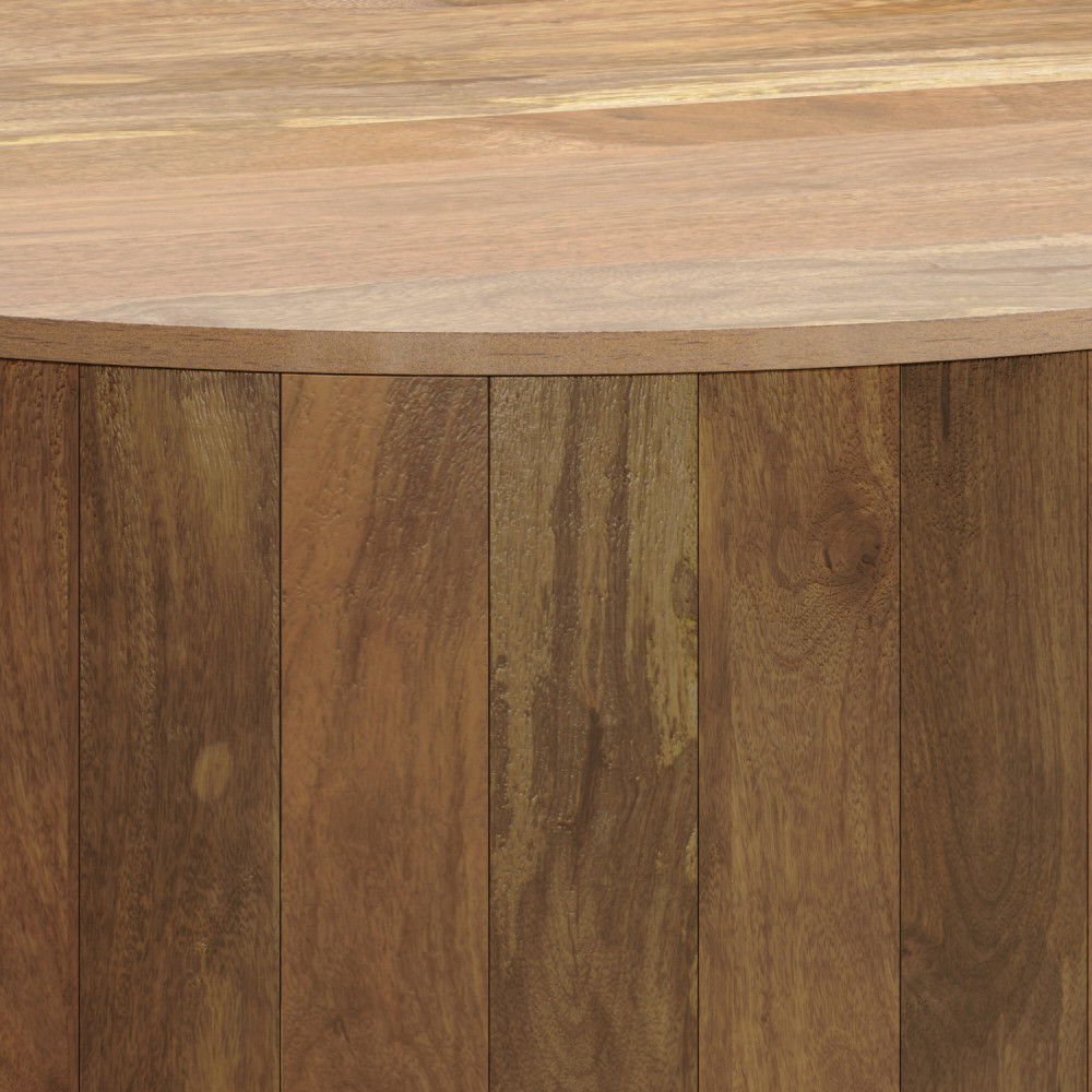 Close-up of the Millbury Drum Coffee Table in Natural, featuring a smooth round top and a base of vertical wood planks that highlight the natural wood grain and varying brown shades.