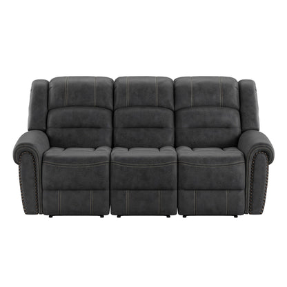 The Ferrar Reclining Sofa in gray is a three-seater with plush cushions, visible stitching, and rounded armrests featuring nailhead trim. The image shows the sofa from the front.