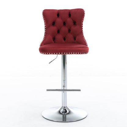 The Swivel Velvet Barstools feature a red, tufted back and seat, silver nailhead trim, and a chrome adjustable pedestal base with footrest. Modern upholstered design, seat height from 25-33", set of 2—perfect for home pub or kitchen island.