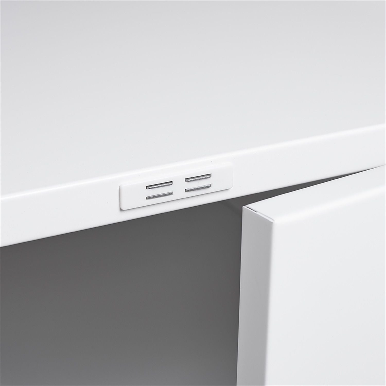 A close-up of the Office Furniture Copier Cabinet 2 Door Steel Copier Stand showing its magnetic catch on the inner edge, which keeps the cabinet doors securely closed.