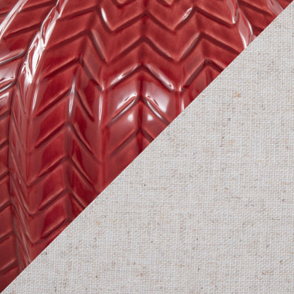 A diagonal split image features glossy red tire treads in the upper left and textured off-white linen fabric—reflecting the modern elegance of the Rockwell - Contemporary Table Lamp (Set of 2).