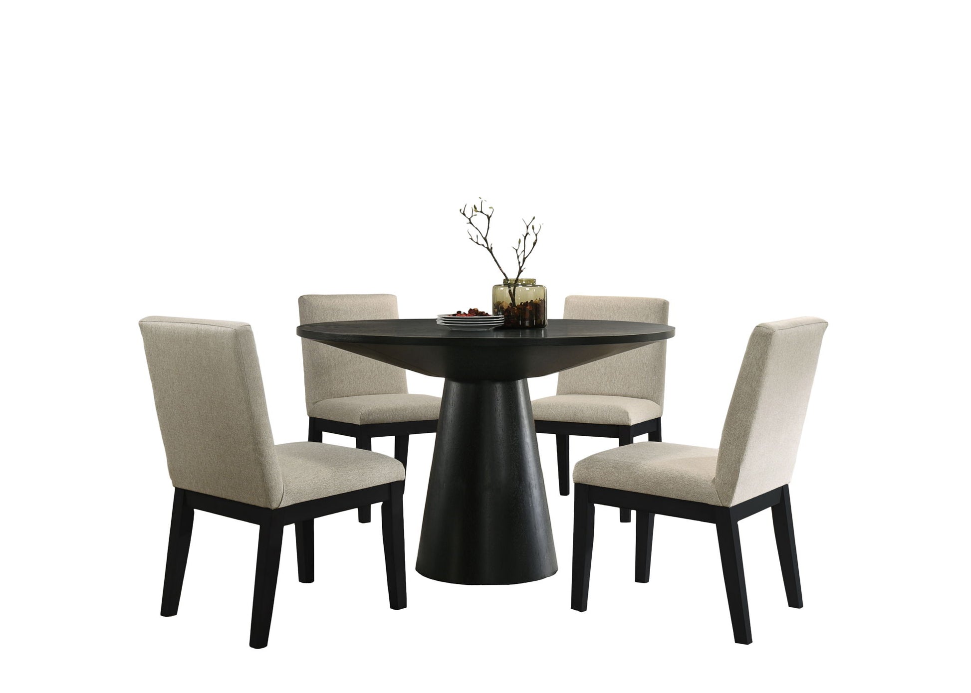 The Jasper set features a modern black round dining table with a central pedestal base, paired with four beige upholstered chairs. A small centerpiece with vases and bare branches decorates the table against a plain white background.
