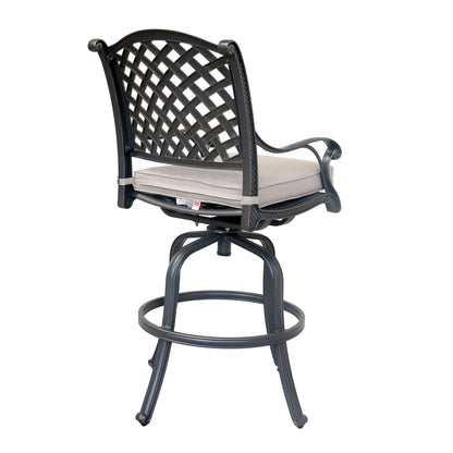 The Bar Stool (Set of 2) features black metal frames, lattice-patterned backrests, curved armrests, circular footrests, light beige cushioned seats, and sturdy four-legged bases for outdoor use.