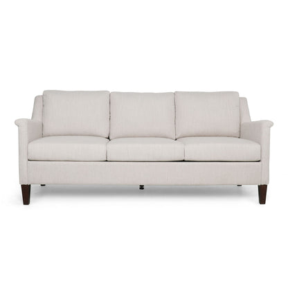 The 3 Seater Contemporary Design Sofa features light beige upholstery, three seat and back cushions, and dark wooden legs, displayed against a white background.
