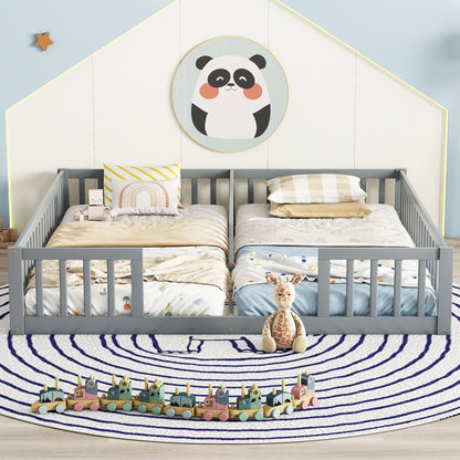 A cozy children’s bedroom features a Double Floor Bed With Fence, Guardrails, Without Door in gray, playful bedding, a plush giraffe toy, a wooden toy train on a round striped rug, and a panda picture hanging above the bed.