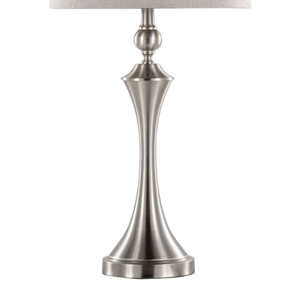 The Flint Contemporary Table Lamp (Set of 2) features a sleek, tapered brushed nickel base with a round pedestal and a partially visible beige shade, plus a built-in USB port for added convenience.