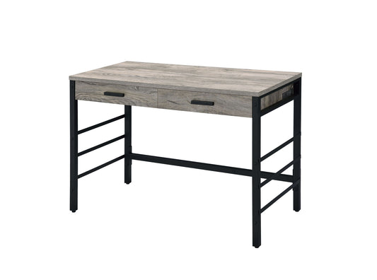 The Disho Weathered Writing Desk with USB in oak features a rectangular design, two front drawers with black handles, and a sleek black metal frame for a modern look.