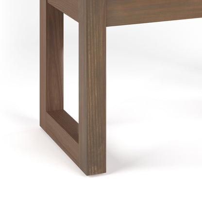 Close-up of the Milltown - Upholstered Ottoman Bench leg, featuring a rectangular hollow frame design with a dark brown wood finish against a plain white background.