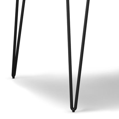 Close-up of two black metal hairpin legs on the Hunter - Square Tabletop Dining Table, shown against a white background with soft shadows.