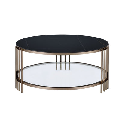 The Abisha Sintered Stone Top Round Table features a modern round design with a black sintered stone top, lower glass shelf, and a bronze metal frame with vertical bars connecting the surfaces.