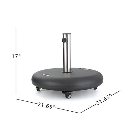 The Wheelie - Round Umbrella Base With Stainless Steel Holder features a round black design with wheels, a central metal pole with an adjustment knob, and measures 17" high by 21.65" wide and deep.