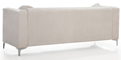 The Elegant Contemporary Sofa is shown from the back in light beige, highlighting its clean lines, low arms, plush cushions, and sleek metal legs.