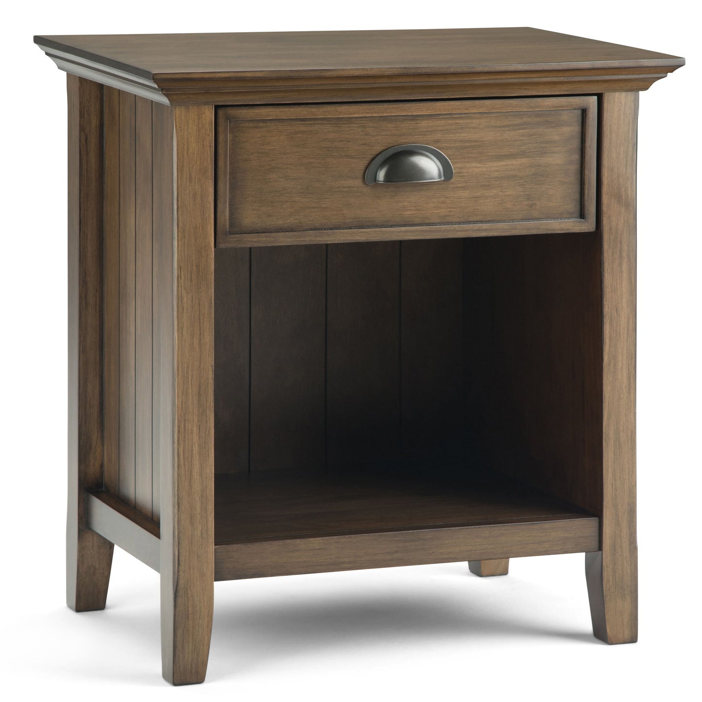 The Acadian Handcrafted Bedside Table is a wooden nightstand with a single drawer featuring a metal handle and an open lower shelf, displayed at an angle against a white background.