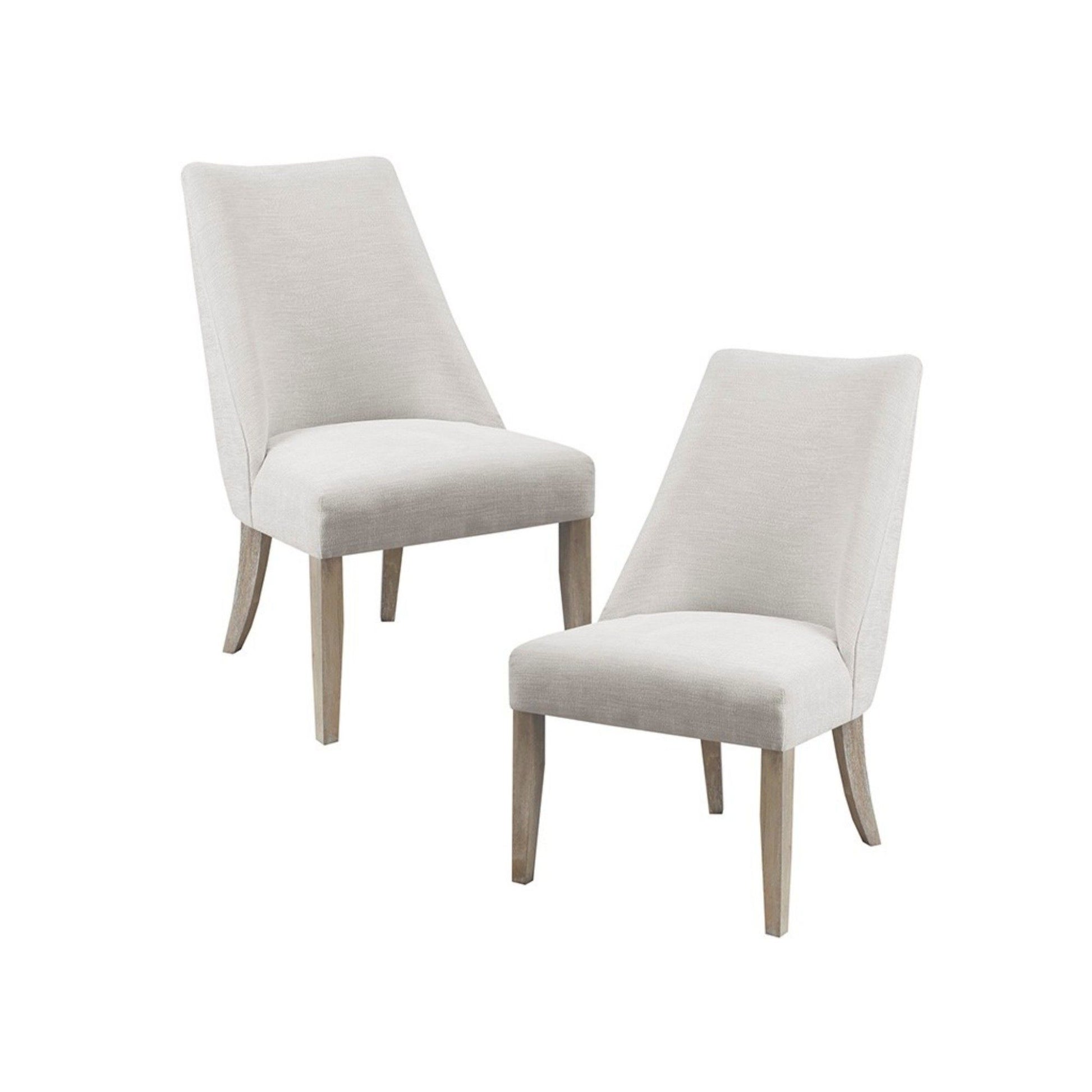 The Comfortable Dining Chair Upholstered (Set of 2) features two light beige high-back chairs with wooden legs, shown side by side on a white background.