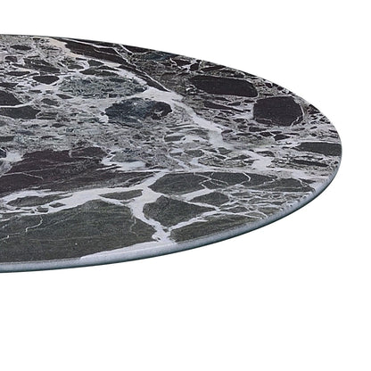 A close-up of the Circa - 17.5" End Table highlights its round top with a smooth, polished, dark marble-textured surface featuring elegant white and gray veining for a sophisticated natural stone look.