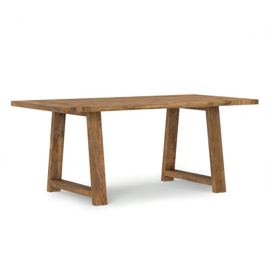 The Whitley Dining Table in Burnt Wax - Brown features a rectangular wooden top and two wide trestle-style legs, shown against a plain white background.