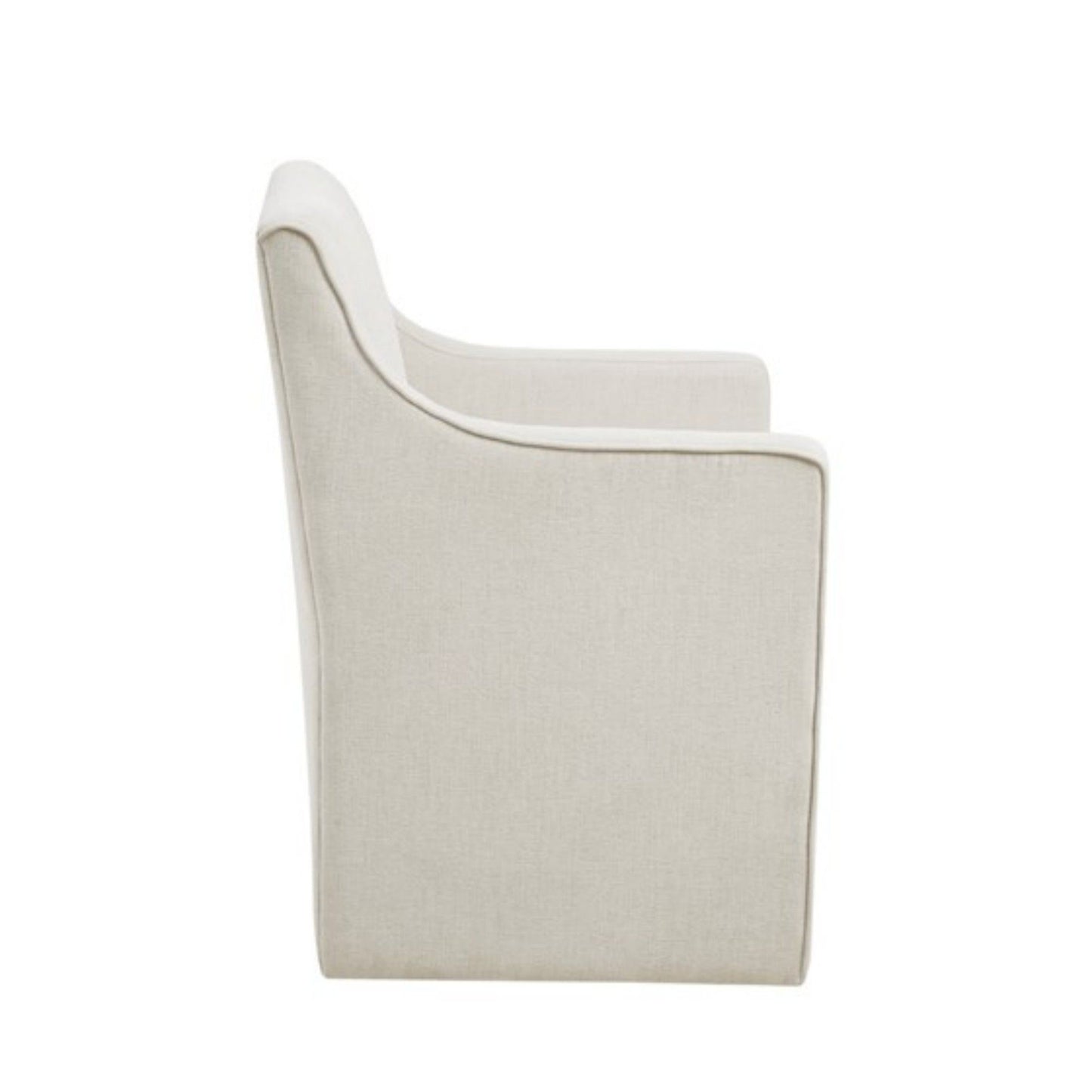 Side view of the Traditional Skirted Dining Arm Chair, upholstered in light beige fabric with clean lines, a straight back, subtly curved armrests, and a tailored skirt. The chair is set against a plain white background.