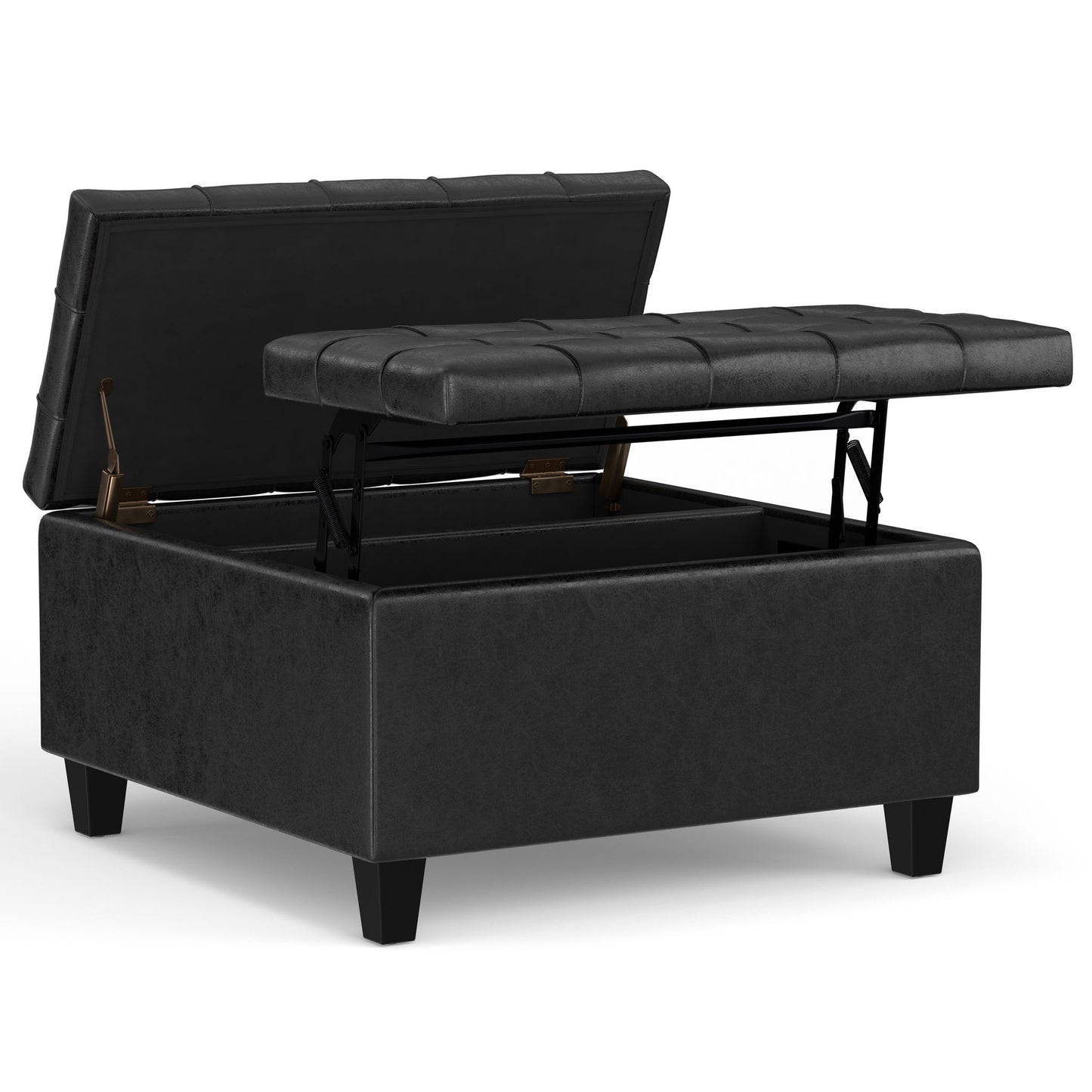The Harrison - Large Coffee Table Storage Ottoman is shown open, displaying its storage space. It features black upholstery, a tufted hinged lid, and stands on four short legs.