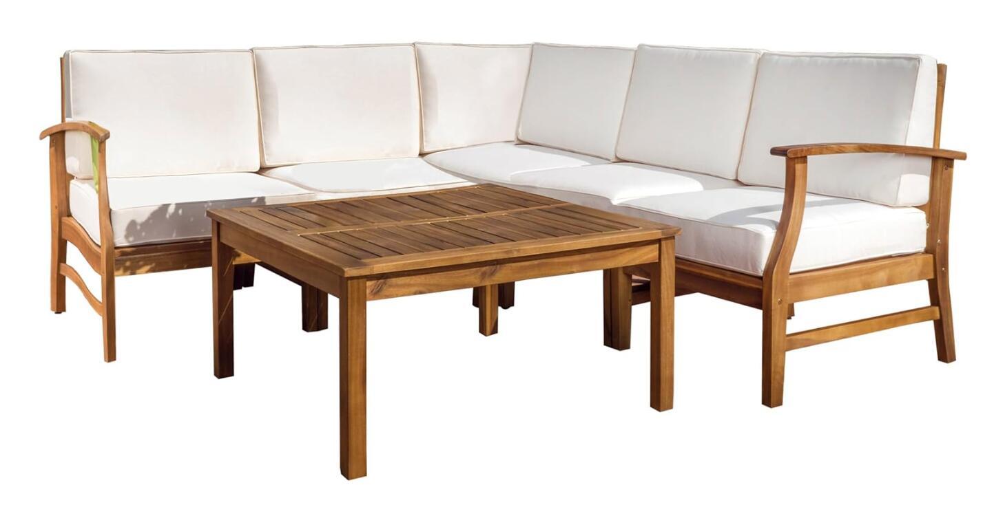 The Perla - 6 Pieces Sofa Set features a wooden outdoor sectional sofa with white cushions and armrests, arranged around a matching square wooden coffee table, all shown on a white background.