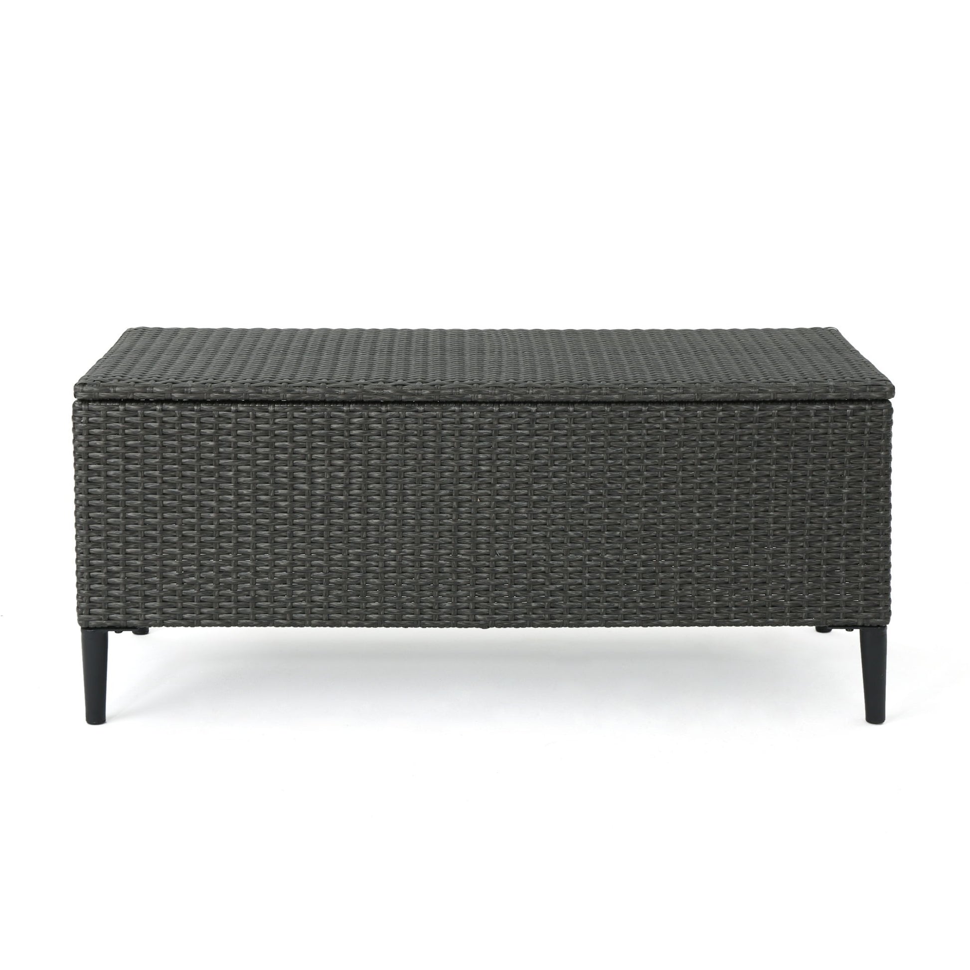 The Rupert Storage Unit is a rectangular outdoor box made of dark resin wicker with four black tapered legs, shown on a white background.