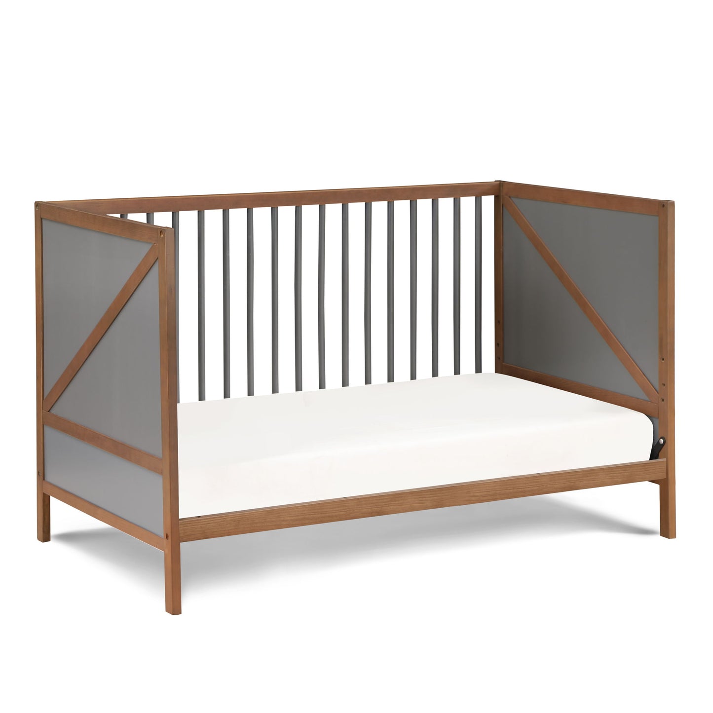 The Pixie Zen 3-in-1 Crib in walnut features gray side panels, black slats, and a simple white mattress, displayed on a white background.