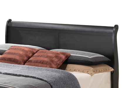 The Louis Phillipe Storage Bed features a black wooden sleigh-style headboard, two dark gray and two brown pillows, gray bedding, and a tan sheet.