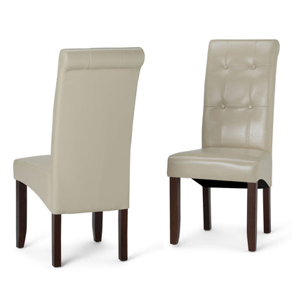 The Cosmopolitan - Deluxe Tufted Parson Upholstered Chair (Set of 2) features two beige leather chairs with dark wooden legs; one is shown from the front and one from the back, highlighting button-tufted backrest detailing.