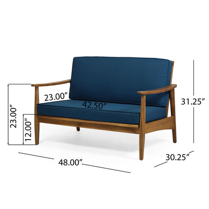 The Outdoor Acacia Wood Loveseat Set With Coffee Table features a wooden frame, blue cushions, and measures 48" wide, 42.5" seat width, 23" arm height/depth, 31.25" total height, 30.25" depth, and a 12" seat height.