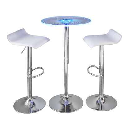 The Spyra Ale - 3 Piece Contemporary Adjustable Bar With Up Set features a modern bar-height table with a glowing blue LED glass top and two white and chrome bar stools with curved seats and footrests.