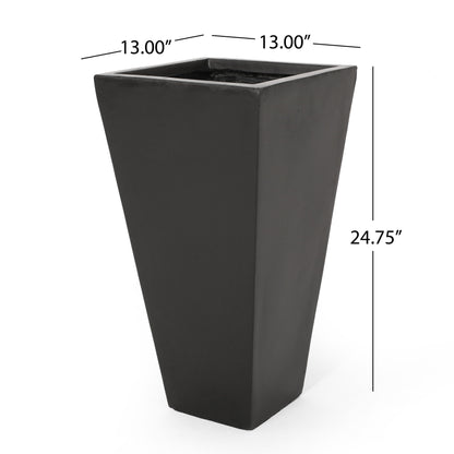 The Outdoor Modern Cast Stone Planter is a tall, black, square tapered planter measuring 13" wide at the top and 24.75" high.