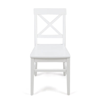 The Plethora Dining Chair With X Shaped Back (Set of 2) is a white wooden chair with a simple design, featuring an X-shaped backrest and four straight legs, shown against a plain white background.