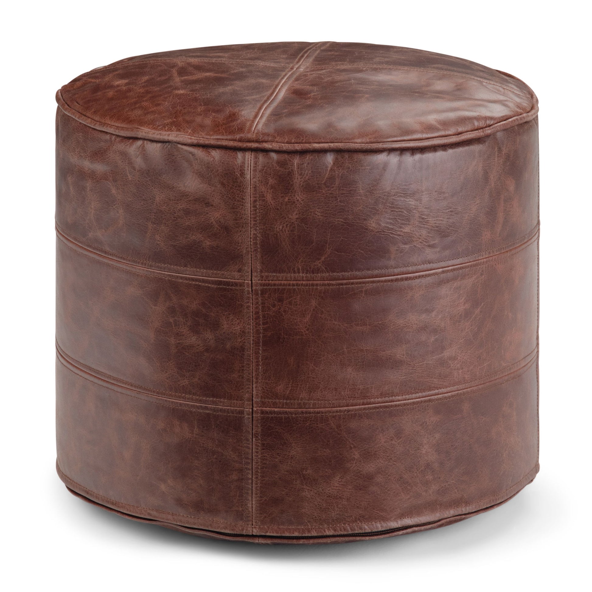The Connor - Handcrafted Round Pouf features brown leather with visible stitching, a smooth, slightly glossy surface, a soft cushioned top, and a cylindrical shape.