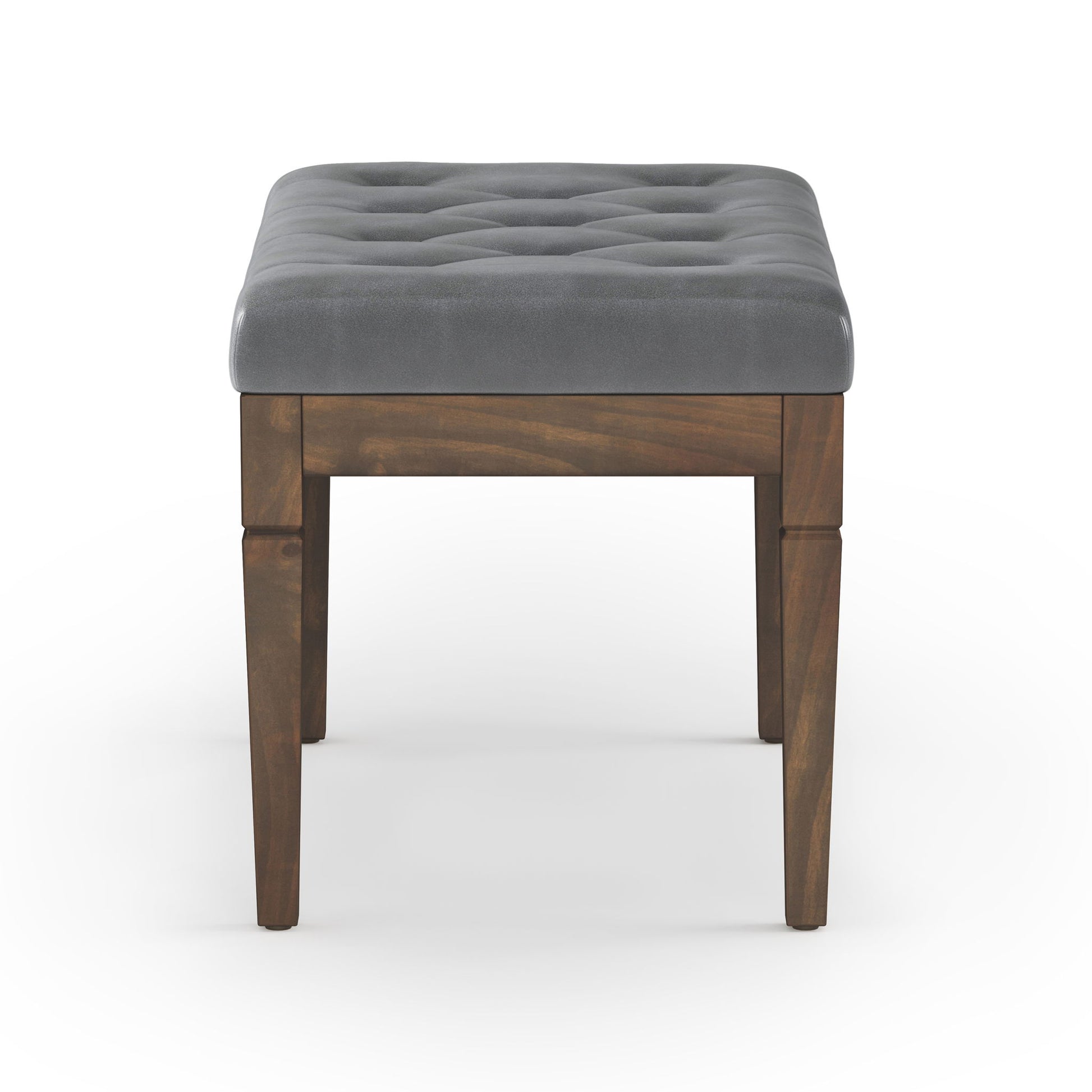 The Waverly Upholstered Tufted Ottoman Bench features a rectangular wooden frame with four legs and a padded gray cushion, shown from the front against a white background.