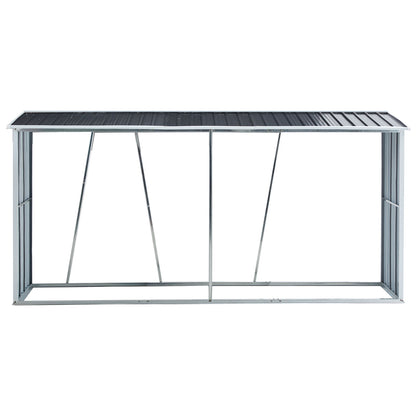 The Firewood Rack is a galvanized steel outdoor log holder with a slanted roof and open sides, ideal for storing firewood. Its rectangular frame and sturdy supports provide stable storage for your backyard, garden, patio, or porch.