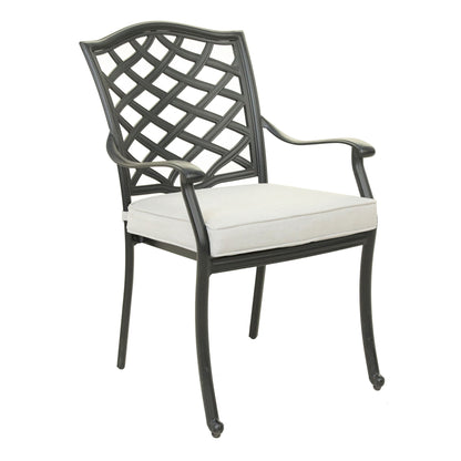 The Aluminum Dining Arm Chair With Cushion (Set of 2) - Cast Silver features a modern lattice backrest, curved arms and legs, plus light beige seat cushions for an elegant touch.
