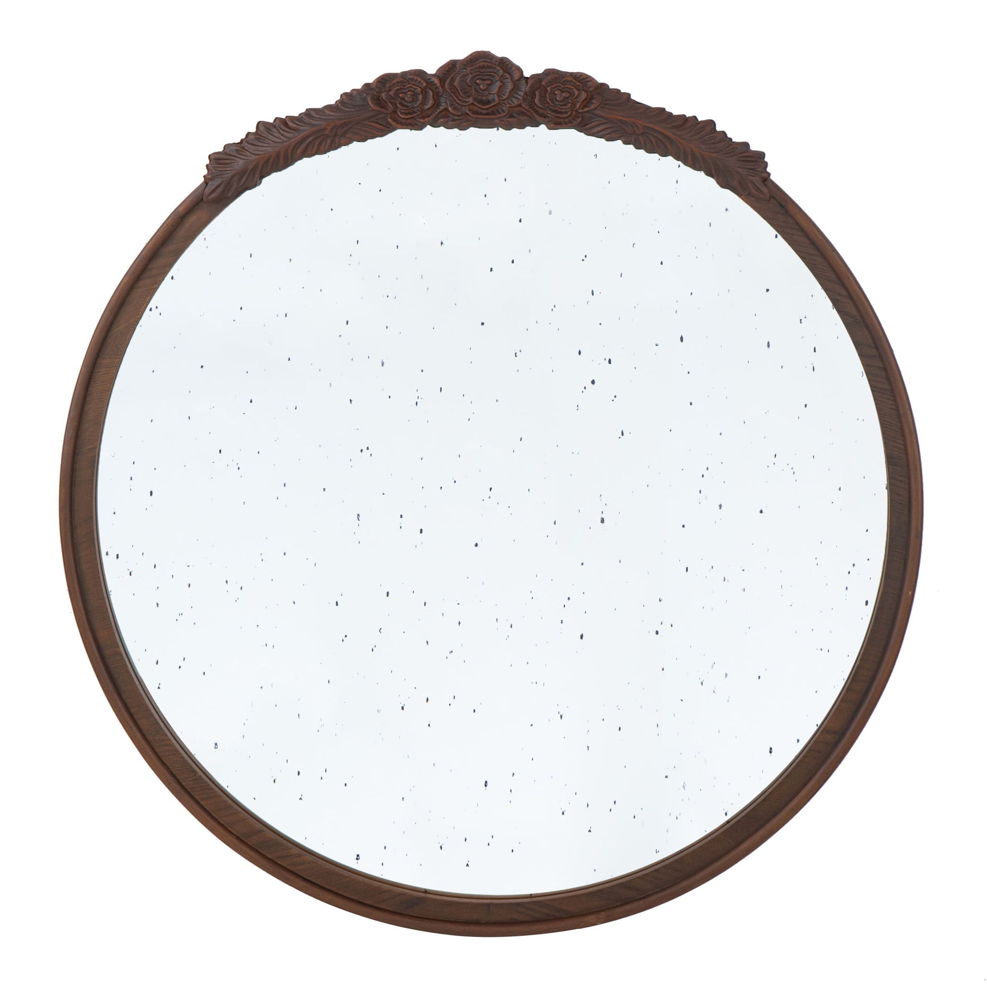 The Round Hand Carved Rose Antique Mirror Frame is a wall mirror for living spaces, featuring a dark wooden frame with carved roses at the top and slightly speckled vintage-style glass.