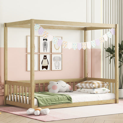 A cozy kids' room features the Canopy Frame Floor Bed With Fence, playful pillows, animal wall art, colorful bunting, a green blanket, and a potted plant against pink and white walls.