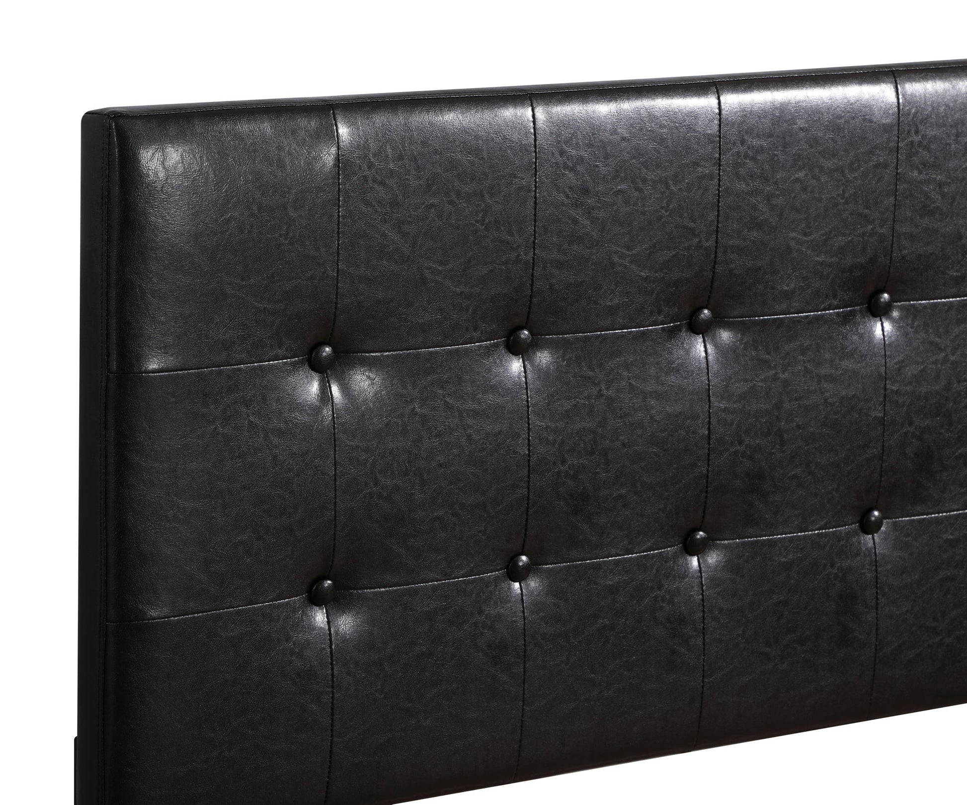 A close-up of the Caldwell Bed's black faux leather tufted headboard, featuring button accents and a smooth, cushioned surface.