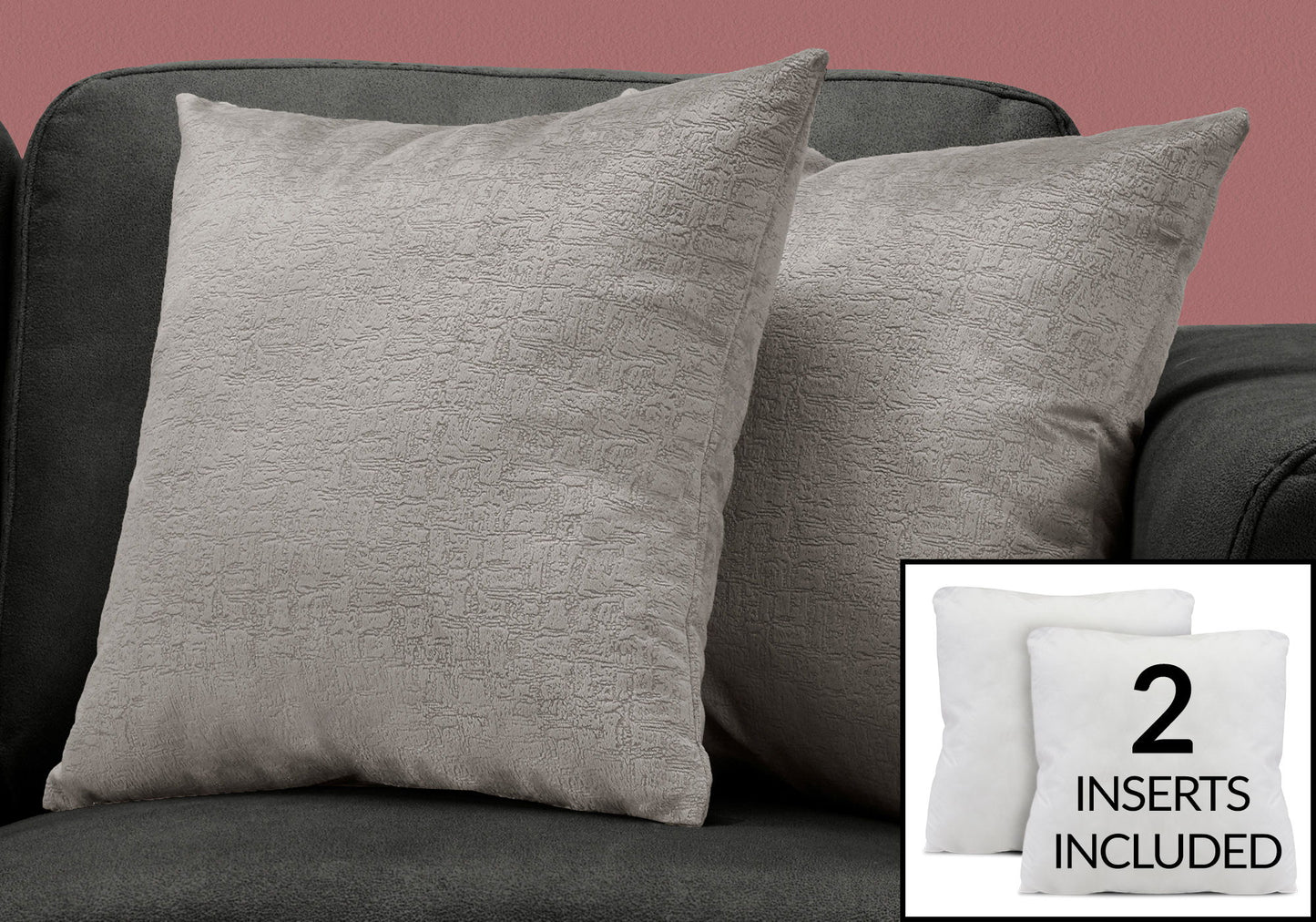 Two light gray Pillow Square decorative throw pillows with inserts included rest on a dark gray sofa; an inset highlights "2 inserts included." Background shows a pink wall. Hypoallergenic.