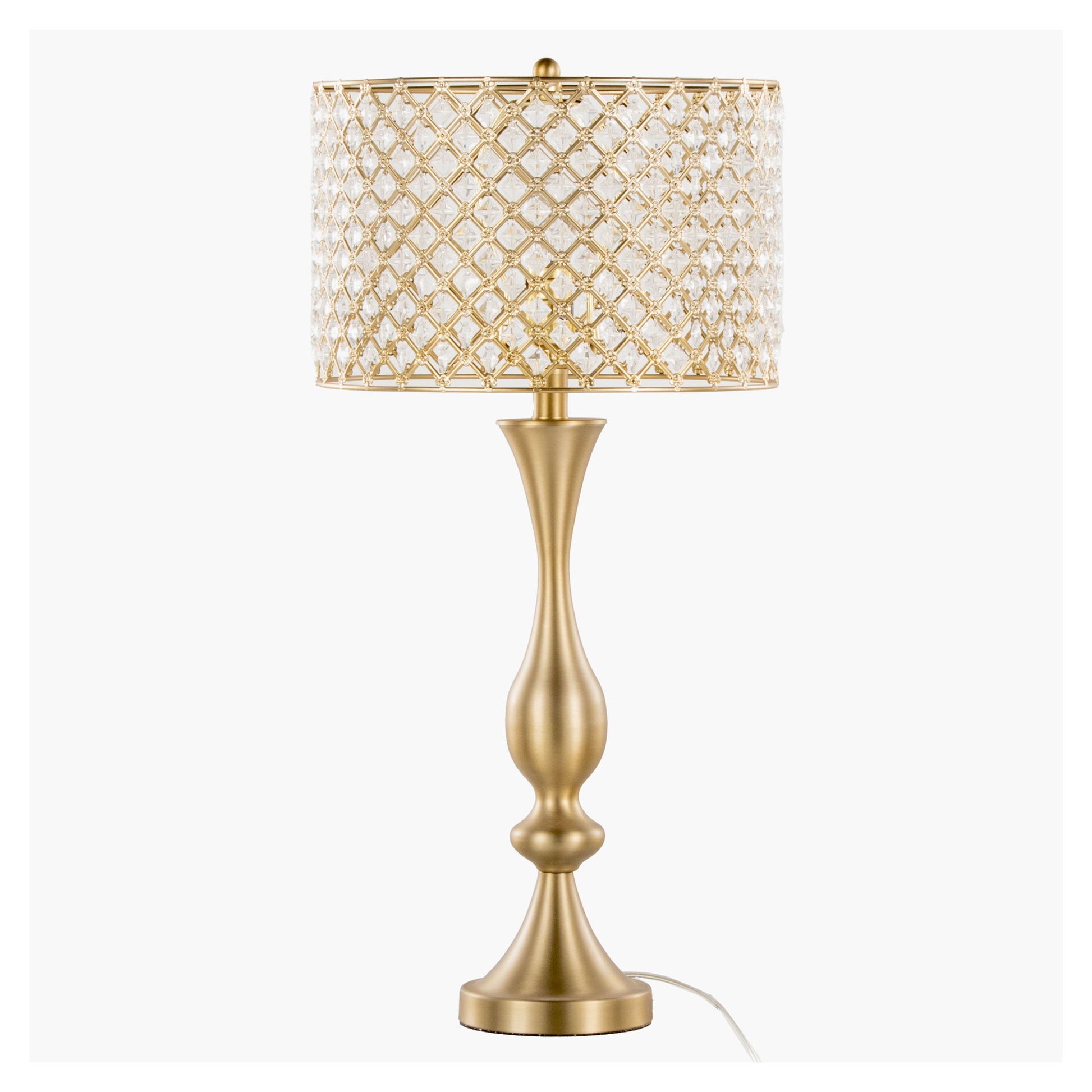 The Topaz – Contemporary Table Lamp features a gold, curvy base and a lattice-patterned shade with crystal accents. An elegant white power cord extends from the bottom, blending modern style with ornate details.