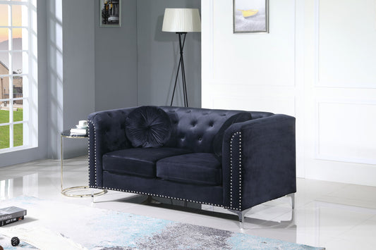 A Stylish Sloped Arm Loveseat in a room.