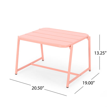 The Conrad - Side Table Outdoor is a small pink metal table with a slatted top, angled legs, and minimalist design, measuring 20.5" W x 19" D x 13.25" H.