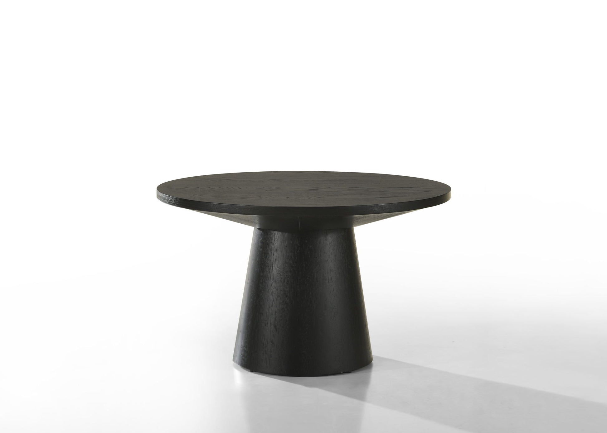 The Jasper 3 Piece Coffee, End, and Console Table Set in Ebony Black features a modern round design with thick tops and wide, tapered cylindrical bases, shown against a plain white background.