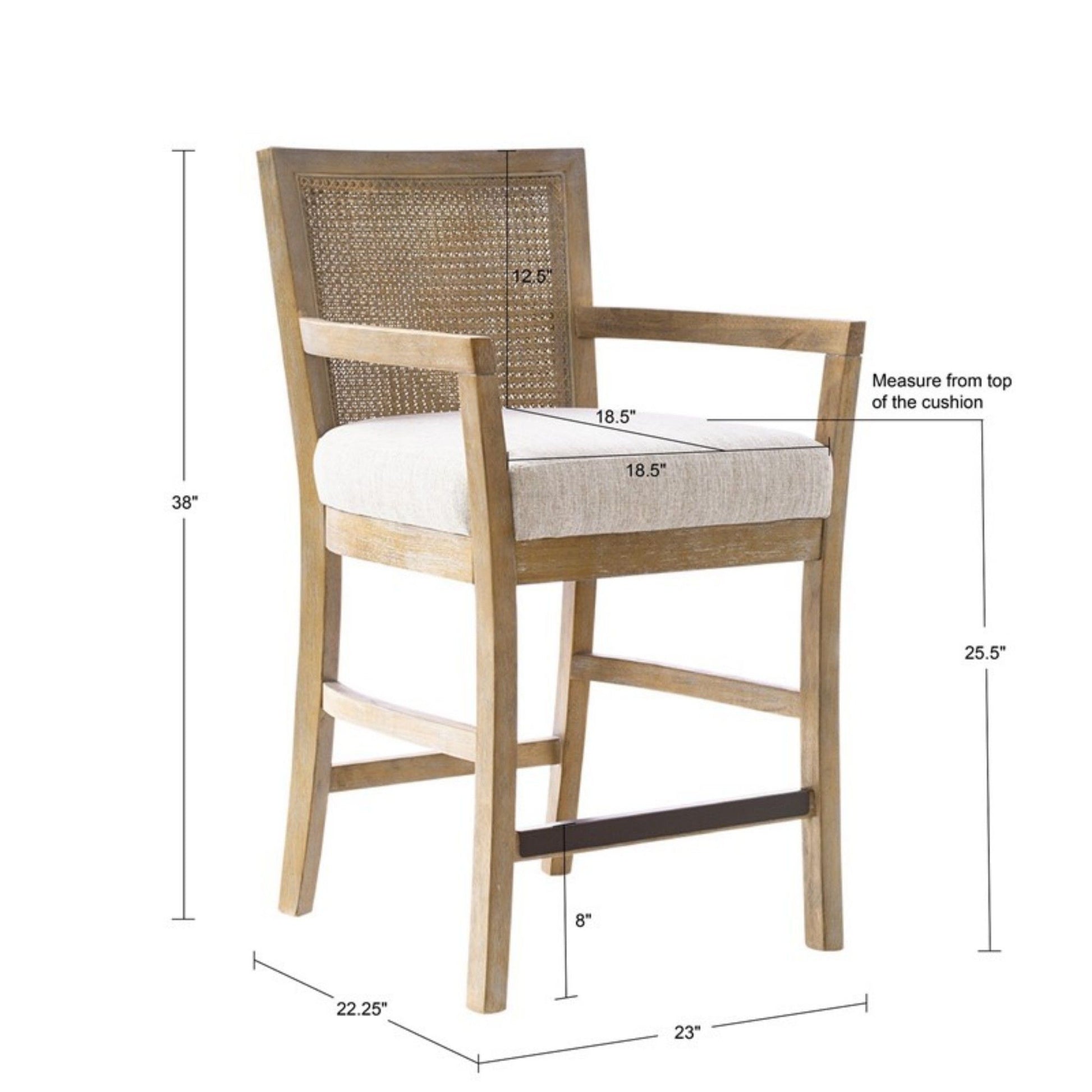 The Cane Back Counter Stool With Upholstered Seat in Cream/Reclaimed Natural features a wooden frame, woven rattan back, upholstered seat, and footrest. Dimensions: H38", SH25.5", SD18.5", SBH12.5", W22.25", D23.5".