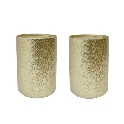 Two Modern Round Accent Tables with a hammered, gold-colored surface are placed side by side against a white background.