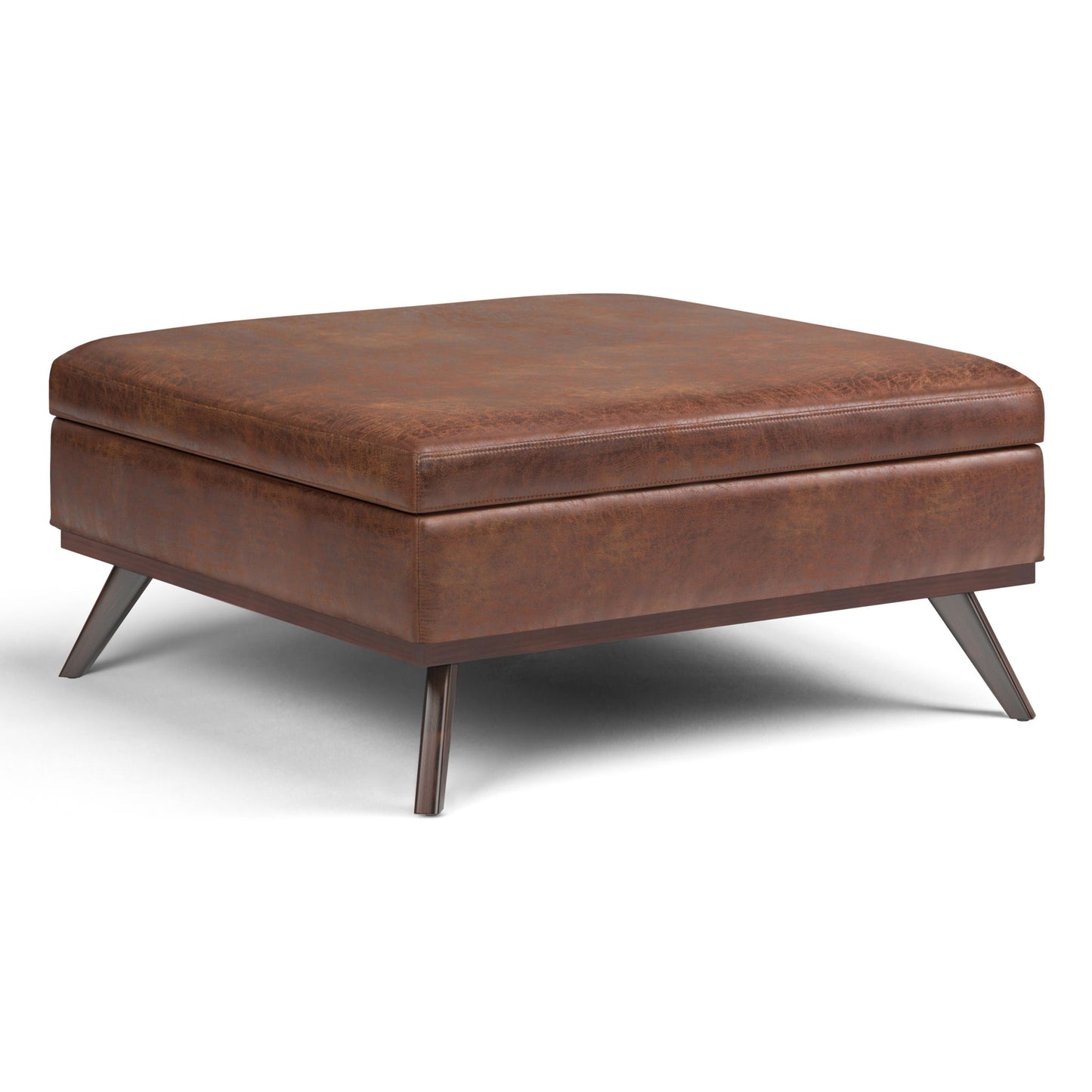 The Owen Multifunctional Square Coffee Table Storage Ottoman features a modern design with brown leather upholstery, angled metal legs, and a flat cushioned top, shown on a white background.