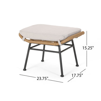 The Outdoor Modern Boho Wicker Ottoman With Cushions (Set of 2) features a beige cushion, woven rattan frame, black metal legs, and measures 23.75" W x 17.75" D x 15.25" H.