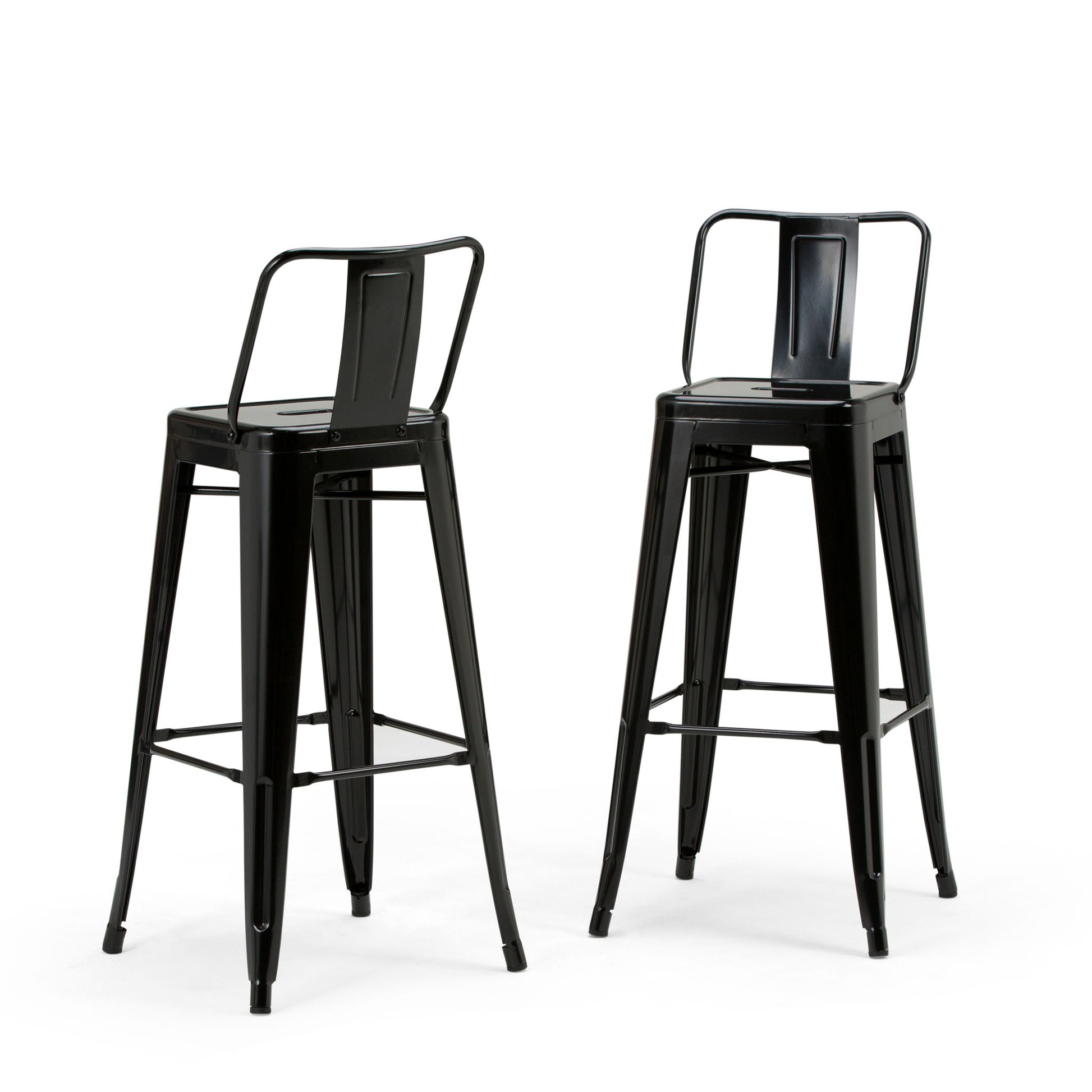 Two Rayne Multifunctional Metal Stools in tall black metal, each with a backrest and footrest, showcase a minimalist industrial design against a white background.