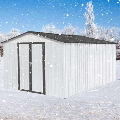 A 10' x 12' Garden Sheds Outdoor Storage Shed with a white metal exterior and dark roof stands in a snowy landscape, surrounded by frost-covered trees beneath a bright blue sky.