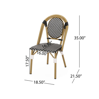 The Outdoor Rattan And Aluminum French Bistro Chair Set features a curved backrest and a checkered black-and-white rattan seat and back. Each chair measures 35" tall, with a 17.5" seat height, 16"x16.5" seat, 18.5" width, and 21.5" depth.